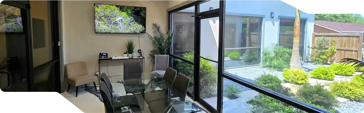  Interior view of a room featuring a patio and garden, showcasing custom residential construction in McAllen.