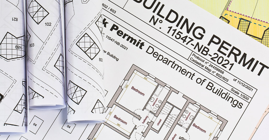 Image of a building permit and application related to new home budgeting in McAllen.
